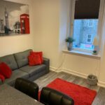 Open-plan living and kitchen area in George Street flat Aberdeen
