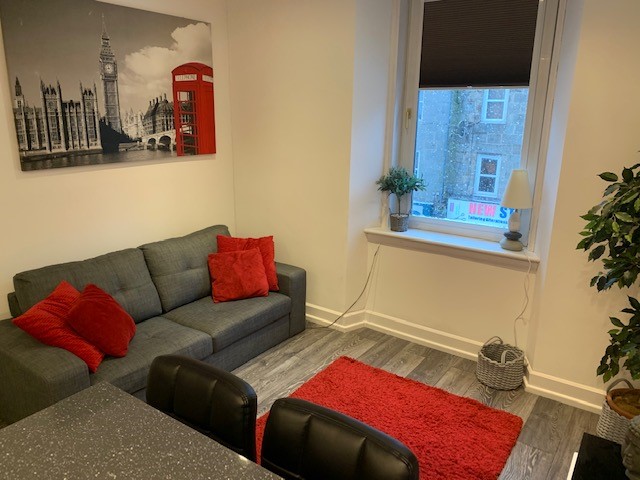 Open-plan living and kitchen area in George Street flat Aberdeen